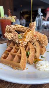 The Funky Door signature dishes Tomato Confit Salmon
Bourbon Chicken & Waffles
NY Strip